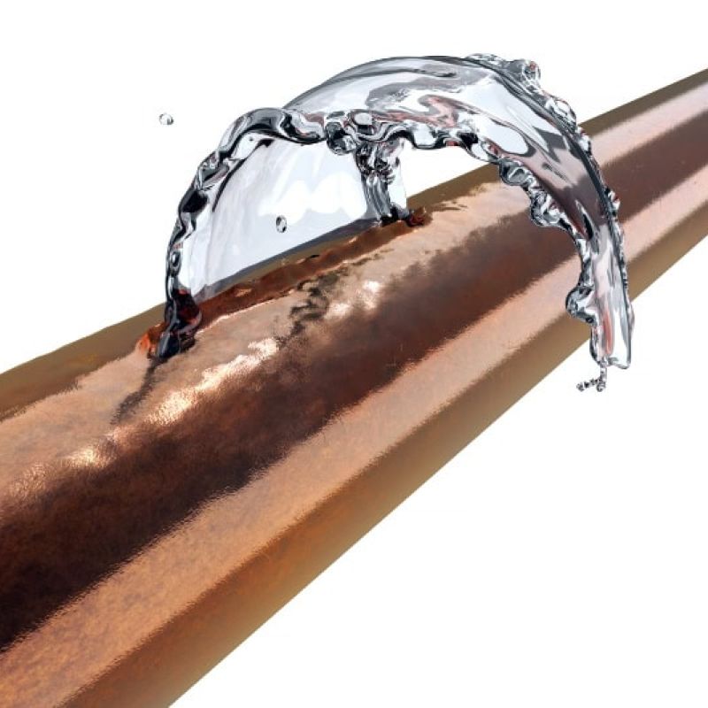 Copper pipe with water splash demonstrating plumbing dynamics and flow efficiency.